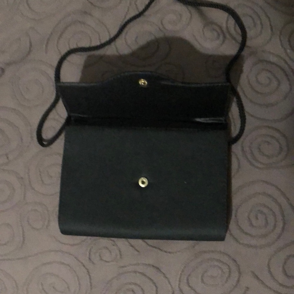 Clutch purse with shoulder string